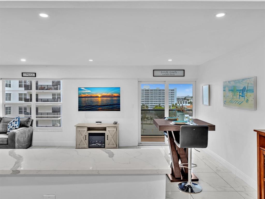 5100 Dupont Boulevard, Unit 8G Fort Lauderdale, FL 33308 - Photo 13 of 65 a living room with furniture and a flat screen tv