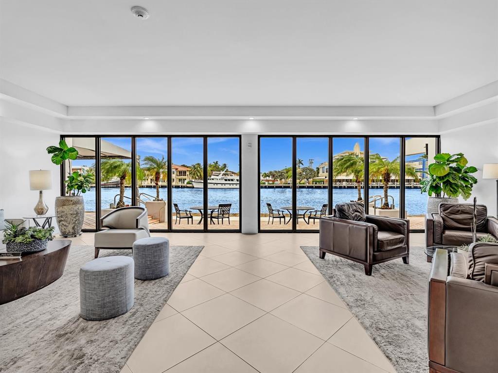5100 Dupont Boulevard, Unit 8G Fort Lauderdale, FL 33308 - Photo 37 of 65 a living room with furniture and a large window