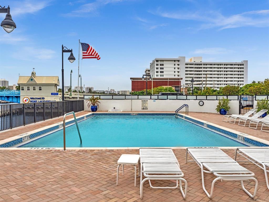 5100 Dupont Boulevard, Unit 8G Fort Lauderdale, FL 33308 - Photo 41 of 65 a terrace with a table and chairs