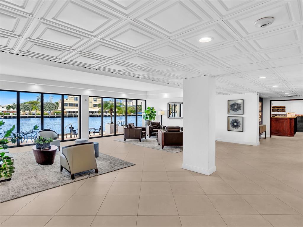 5100 Dupont Boulevard, Unit 8G Fort Lauderdale, FL 33308 - Photo 48 of 65 a lobby with furniture and floor to ceiling window