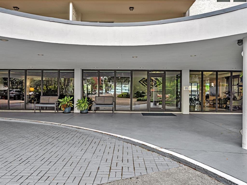 5100 Dupont Boulevard, Unit 8G Fort Lauderdale, FL 33308 - Photo 51 of 65 a view of a building with car parked