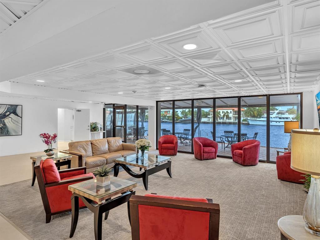 5100 Dupont Boulevard, Unit 8G Fort Lauderdale, FL 33308 - Photo 56 of 65 a living room with furniture kitchen view and a large window