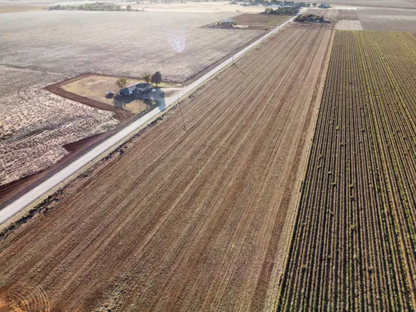 a view of a balcony with wooden floor