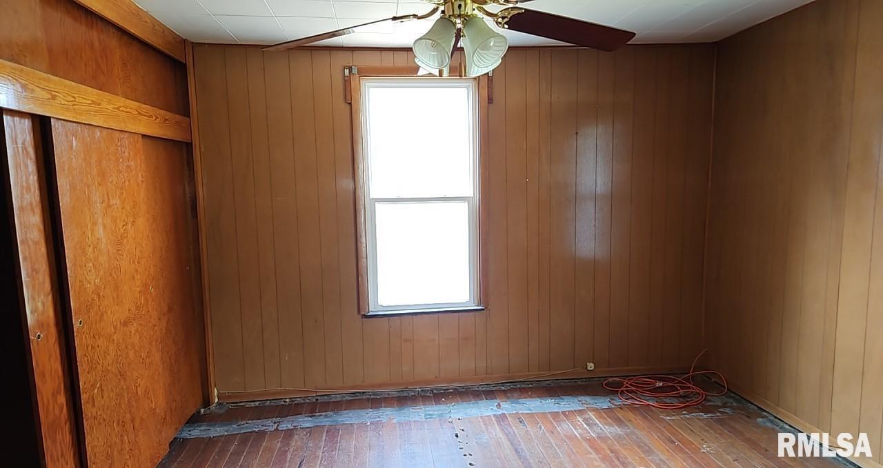 2130 Rains Street Murphysboro, IL 62966 - Photo 15 of 18 a view of an empty room with wooden floor and a window