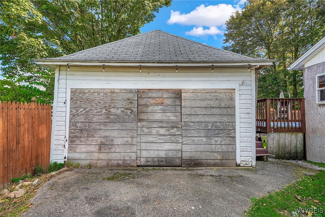 72 North Center Street Perry, NY 14530 - Photo 5 of 46 Garage has a wood stove for heat and it has electric