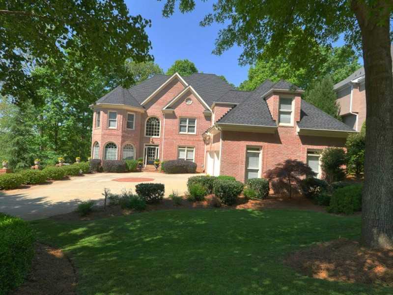 9755 Rod Road Alpharetta, GA 30022 - Photo 1 of 1 Exterior Front. Three sides brick home w/ 3 car garage & great curb appeal.
