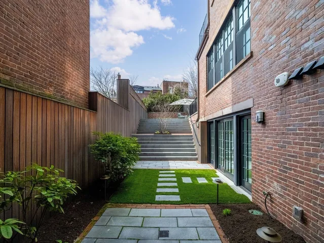 a view of a house with a garden