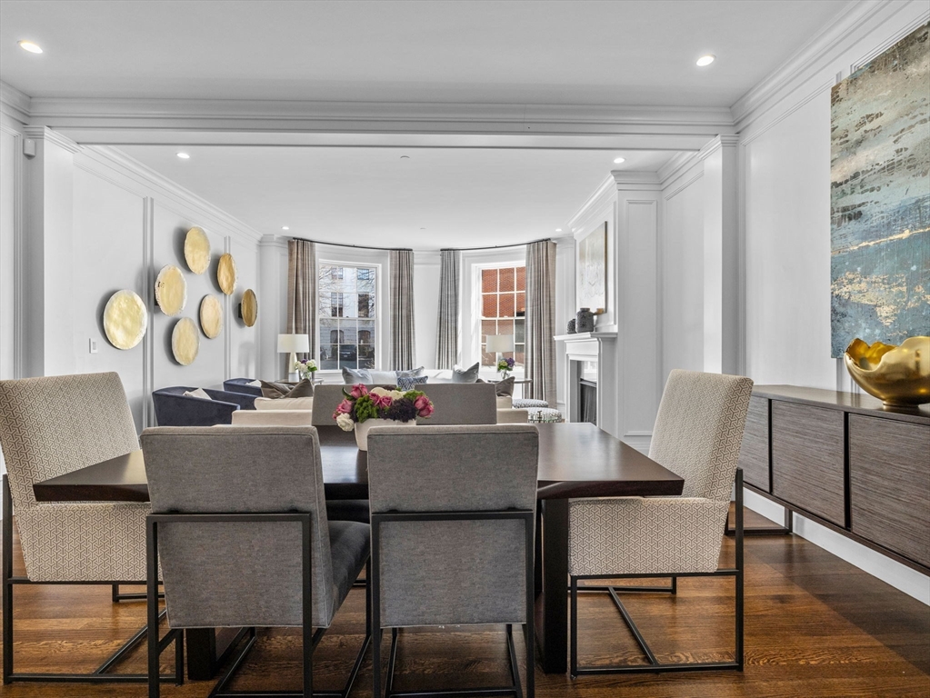 5 Joy Street, Unit 1 Boston, MA 02108 - Photo 4 of 32 a view of a dining room with furniture and wooden floor