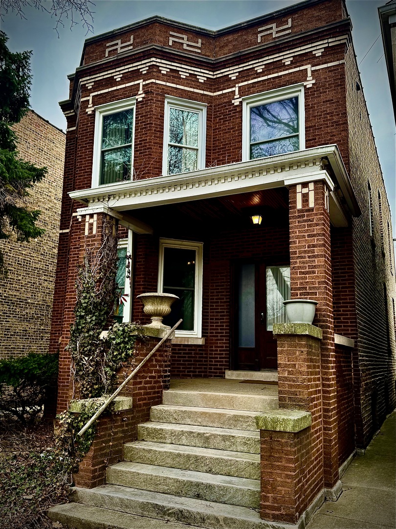 4913 North Keystone Avenue Chicago, IL 60630 - Photo 1 of 1 a front view of a house