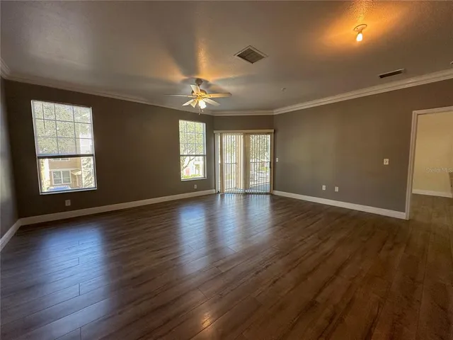 a kitchen with stainless steel appliances granite countertop a refrigerator sink and stove