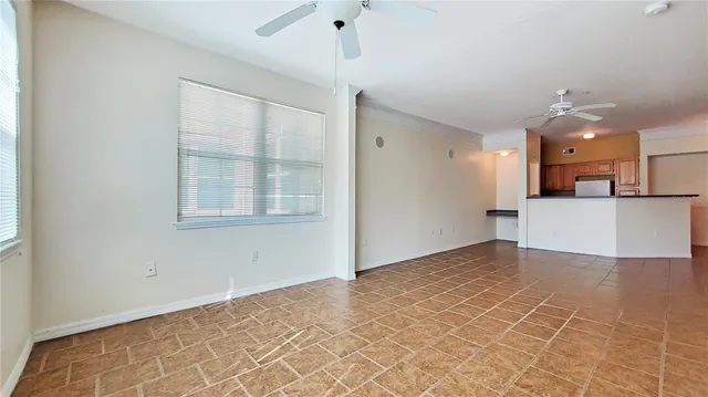 a view of a kitchen with a sink and a window