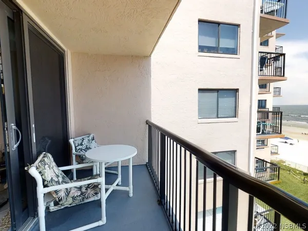a view of a balcony with city view