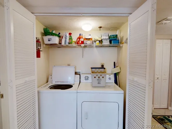 a view of swimming pool with lounge chair