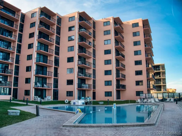 a view of a terrace with a lake view
