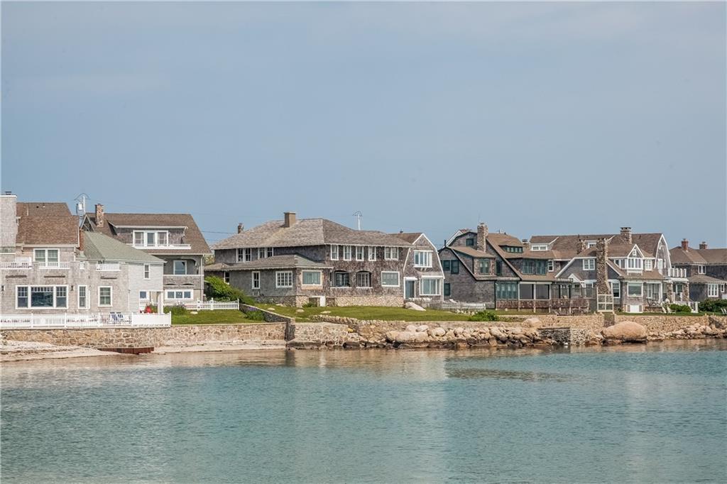 14 Clubhouse Point Road Groton, CT 06340 - Photo 1 of 1 a view of residential building with lake view and boat