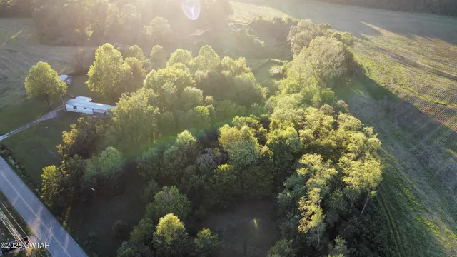 a bathroom with a light fixture and a stove
