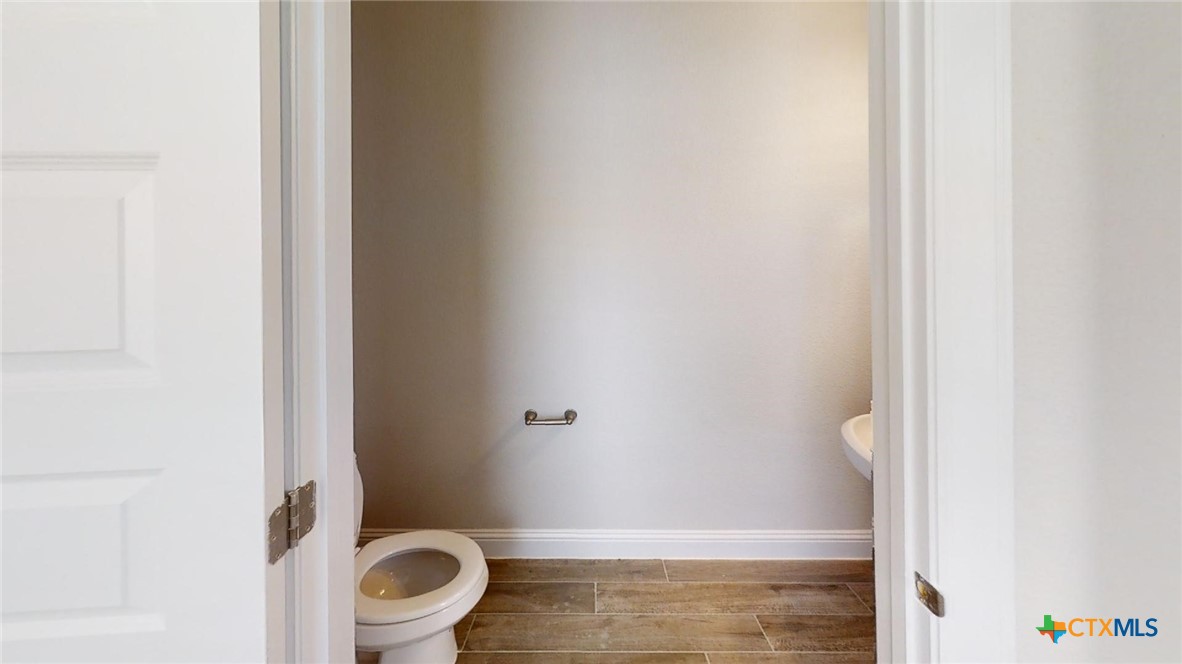 116 Hidden Branch Cove Maxwell, TX 78656 - Photo 18 of 23 a bathroom with a toilet and a shower