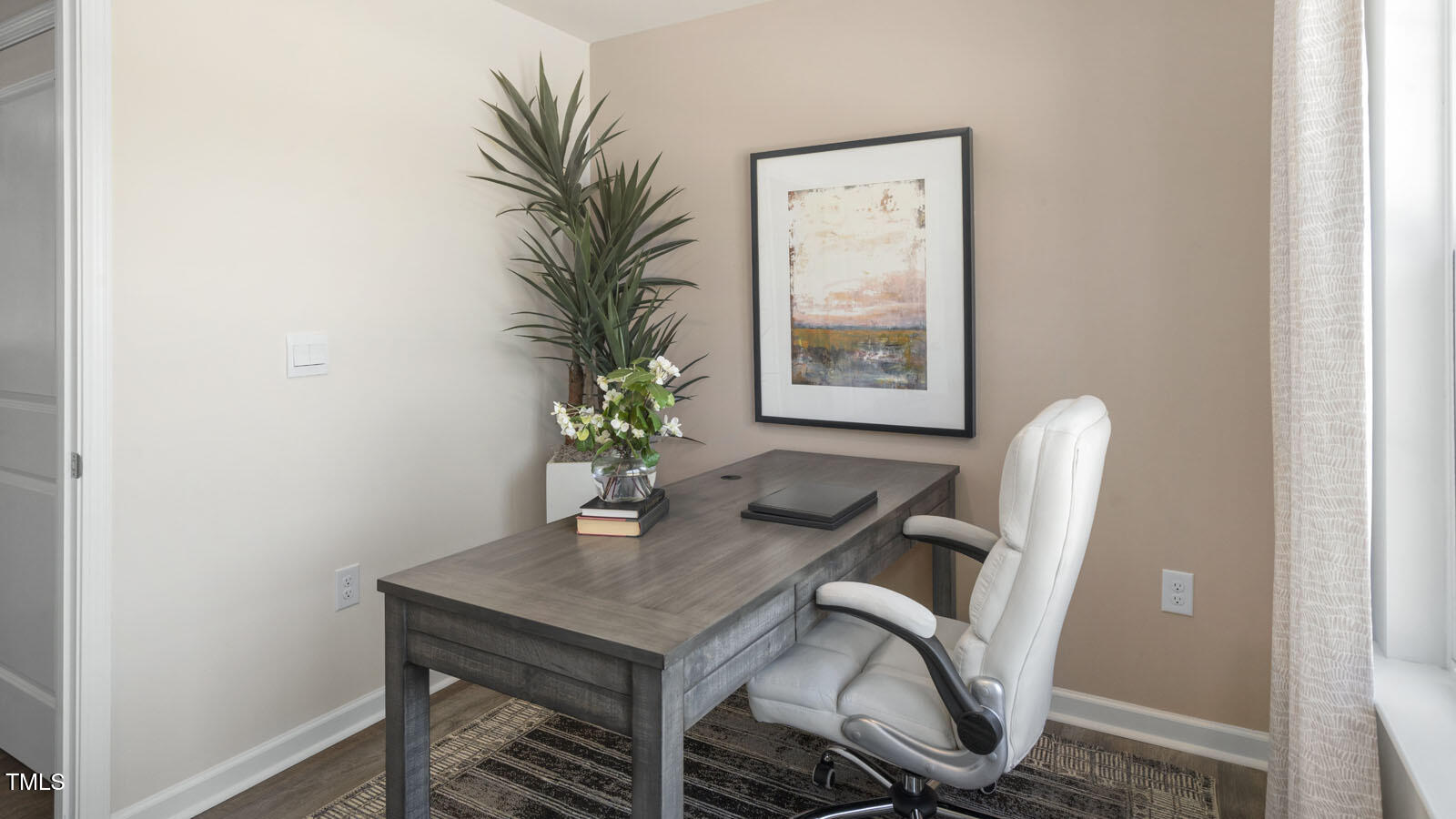 8523 Beckett Chase Way Raleigh, NC 27616 - Photo 4 of 31 a view of a workspace with furniture and window