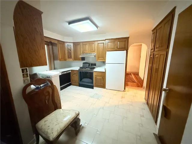 a view of entryway and hall with a window