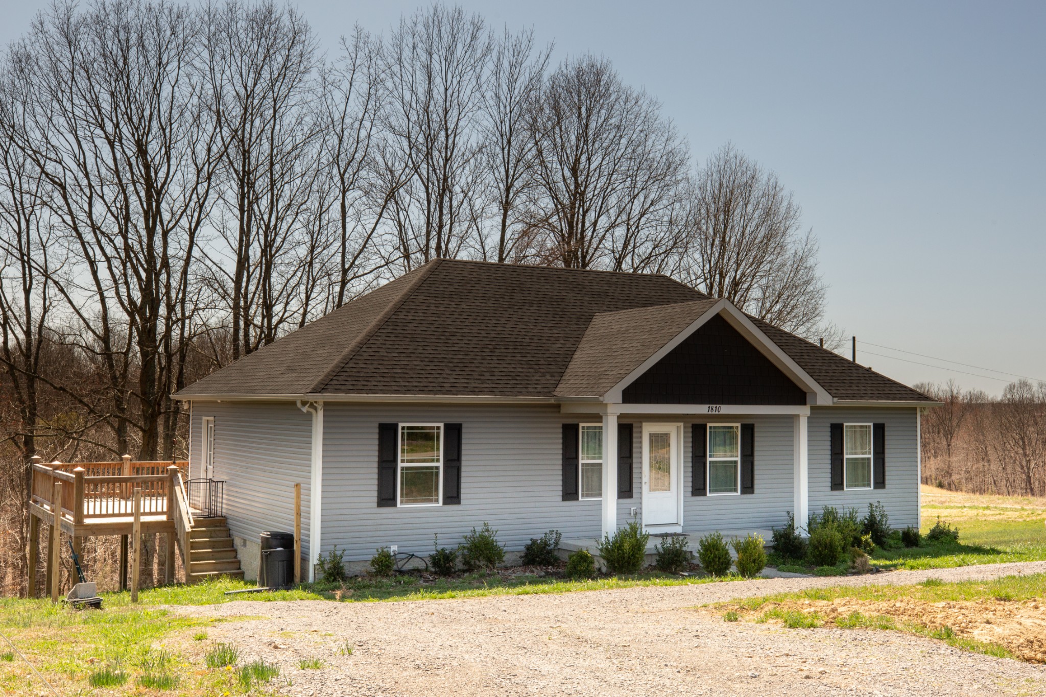 1810 Holland Road Lafayette, TN 37083 - Photo 3 of 10 a front view of a house with a yard