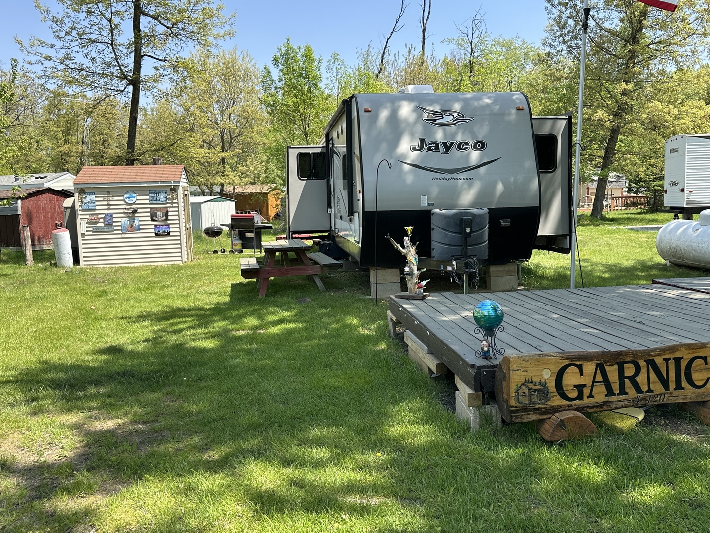 a view of outdoor space with garden and seating area
