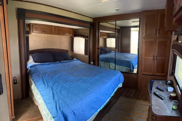 a bathroom with a sink a mirror and a toilet