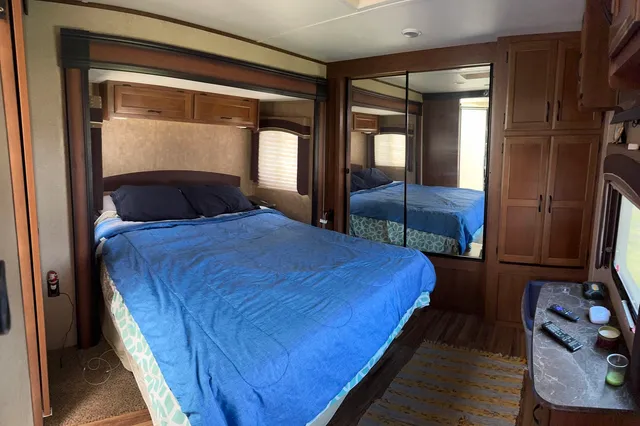 a bathroom with a sink a mirror and a toilet