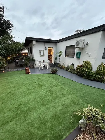 a front view of a house with patio
