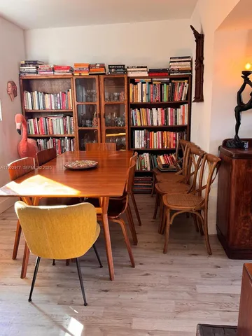 a view of a workspace with furniture