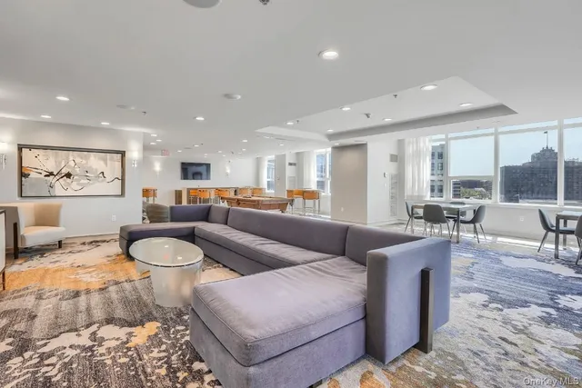 a living room with furniture and a table