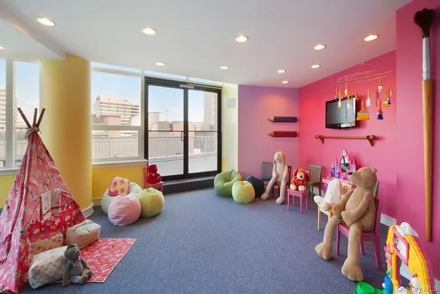 a bed room with furniture and a window