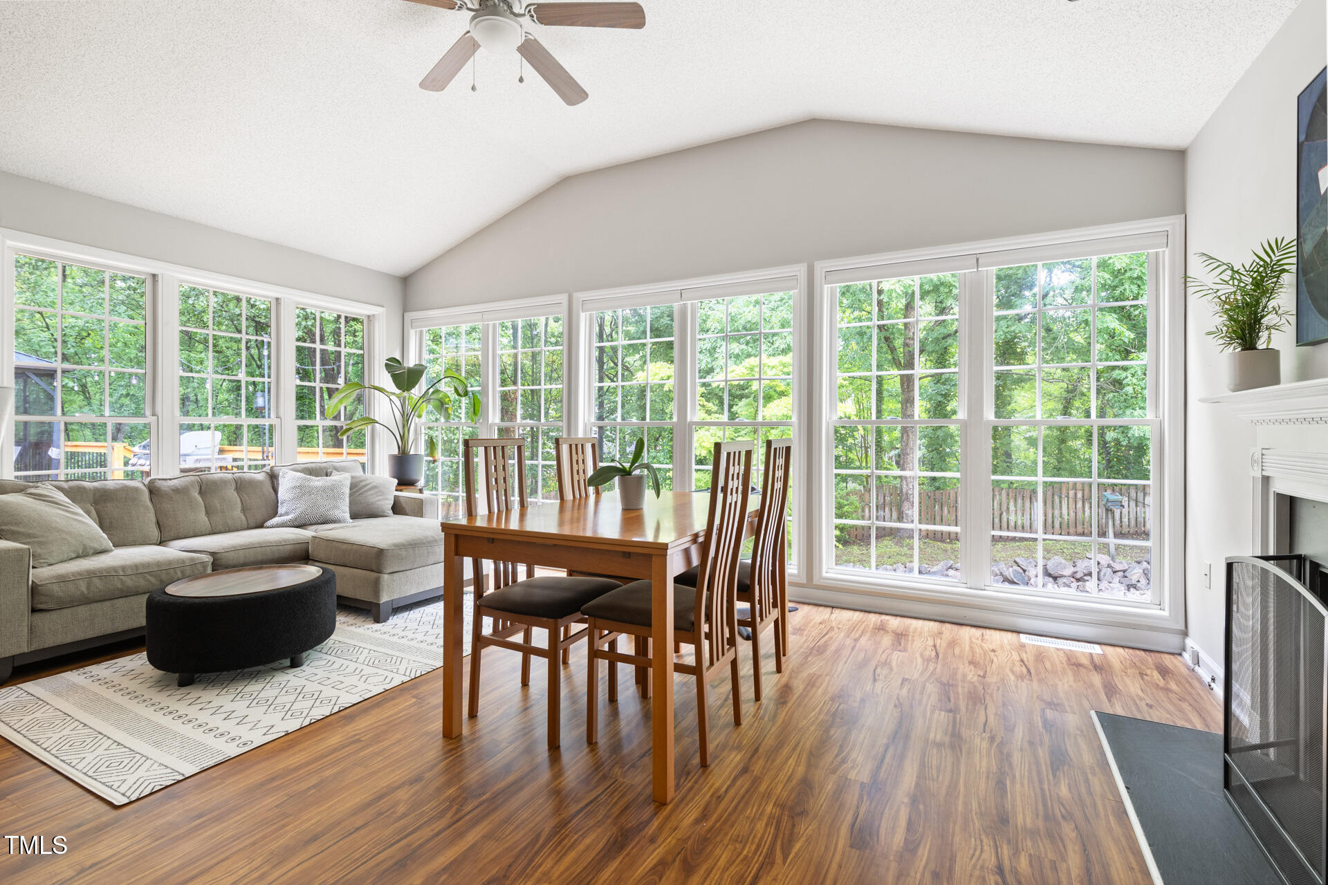 2301 Bolingbrook Lane Raleigh, NC 27613 - Photo 14 of 36 a living room with furniture and wooden floor
