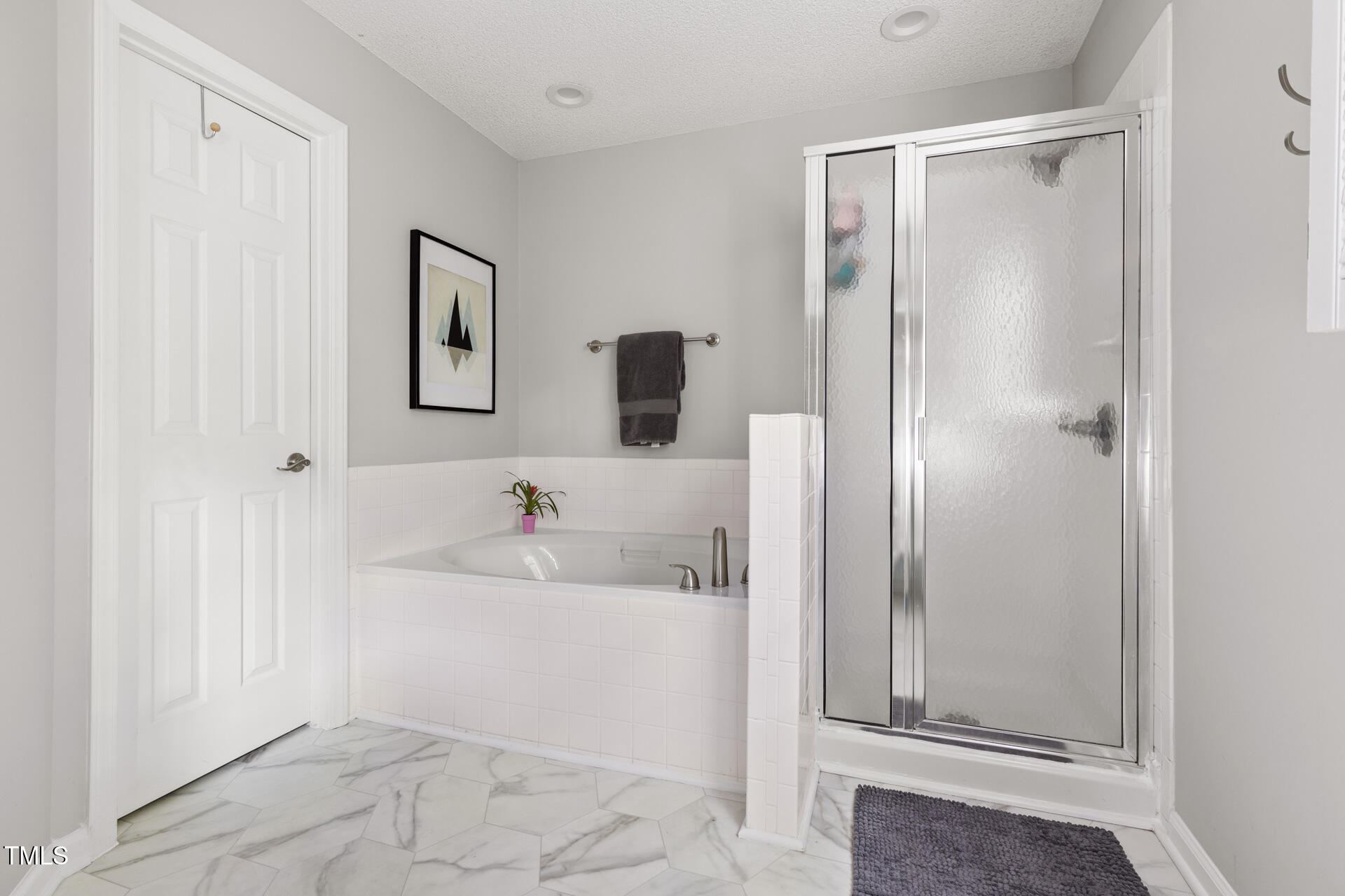 2301 Bolingbrook Lane Raleigh, NC 27613 - Photo 24 of 36 a bathroom with a sink and a mirror