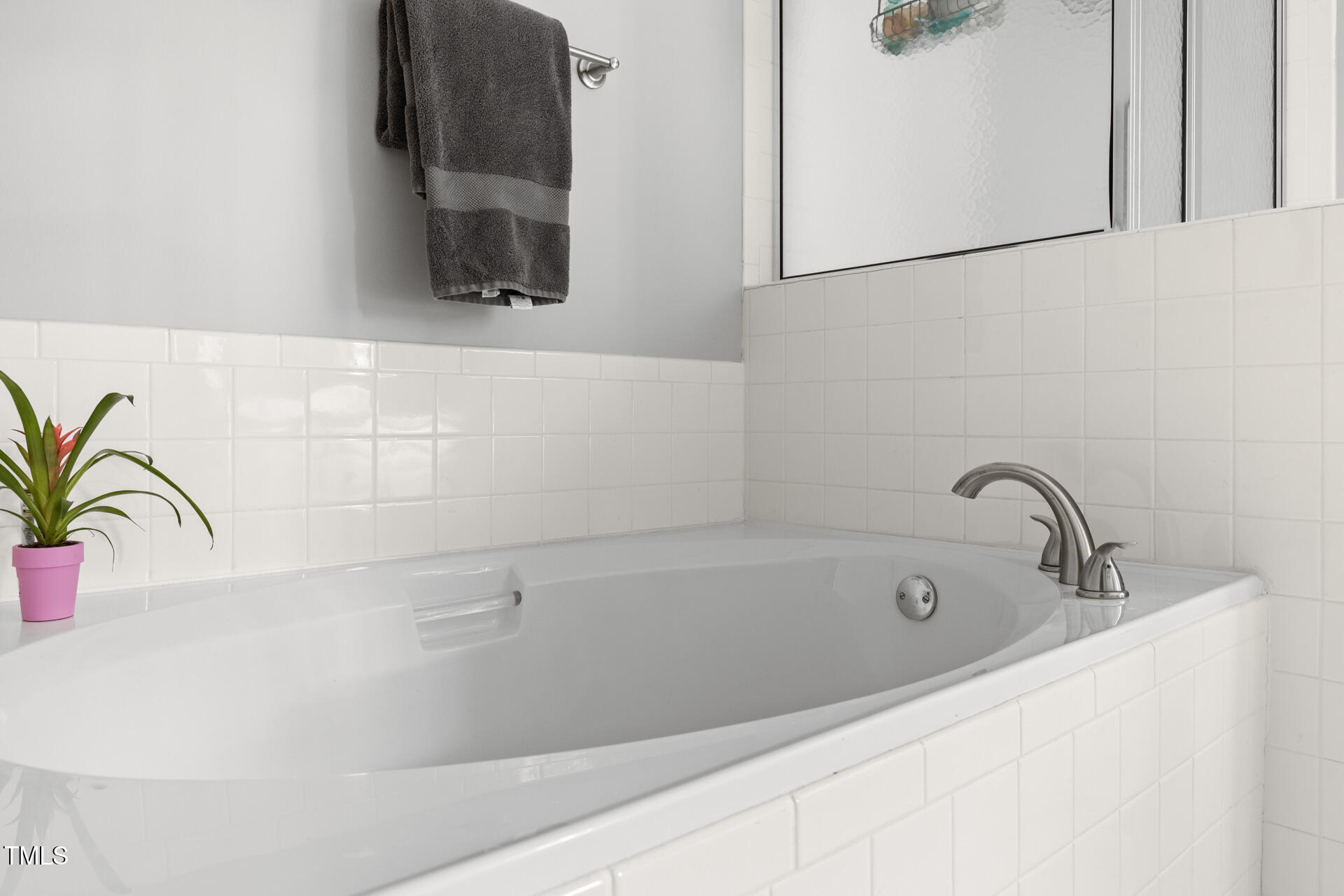 2301 Bolingbrook Lane Raleigh, NC 27613 - Photo 26 of 36 a bathroom with a bathtub