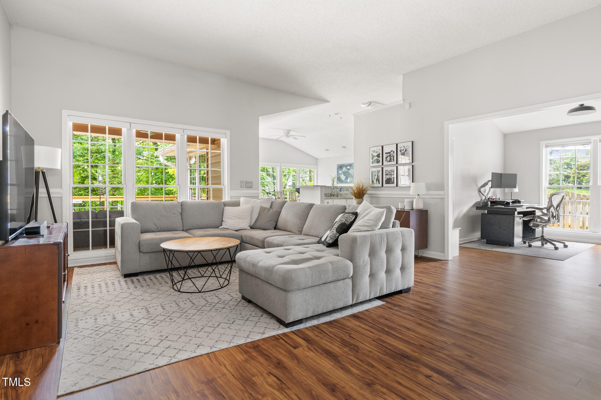 2301 Bolingbrook Lane Raleigh, NC 27613 - Photo 5 of 36 a living room with furniture and a large window