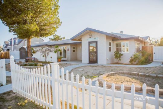 823 North Fairview Street Ridgecrest, CA 93555 - Photo 2 of 35 a view of a house with wooden fence