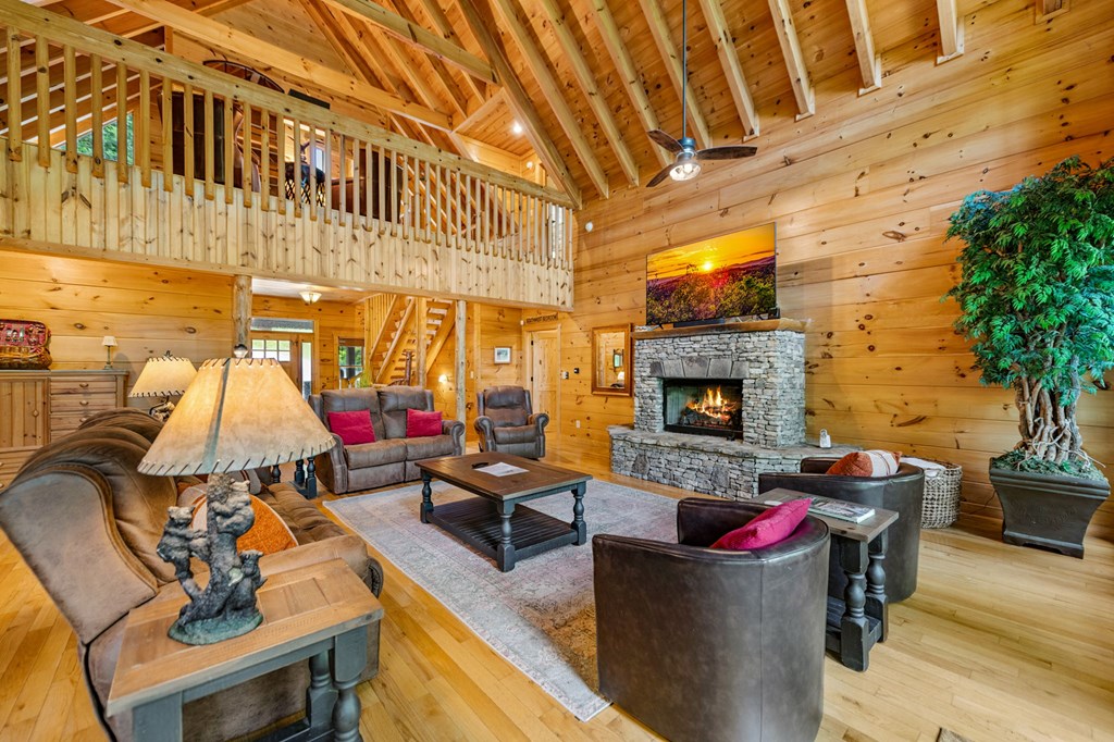 1082 Sunset Road Epworth, GA 30541 - Photo 40 of 98 a living room with furniture and a fireplace