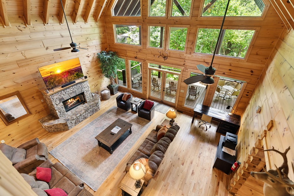 1082 Sunset Road Epworth, GA 30541 - Photo 74 of 98 a living room with furniture and a flat screen tv