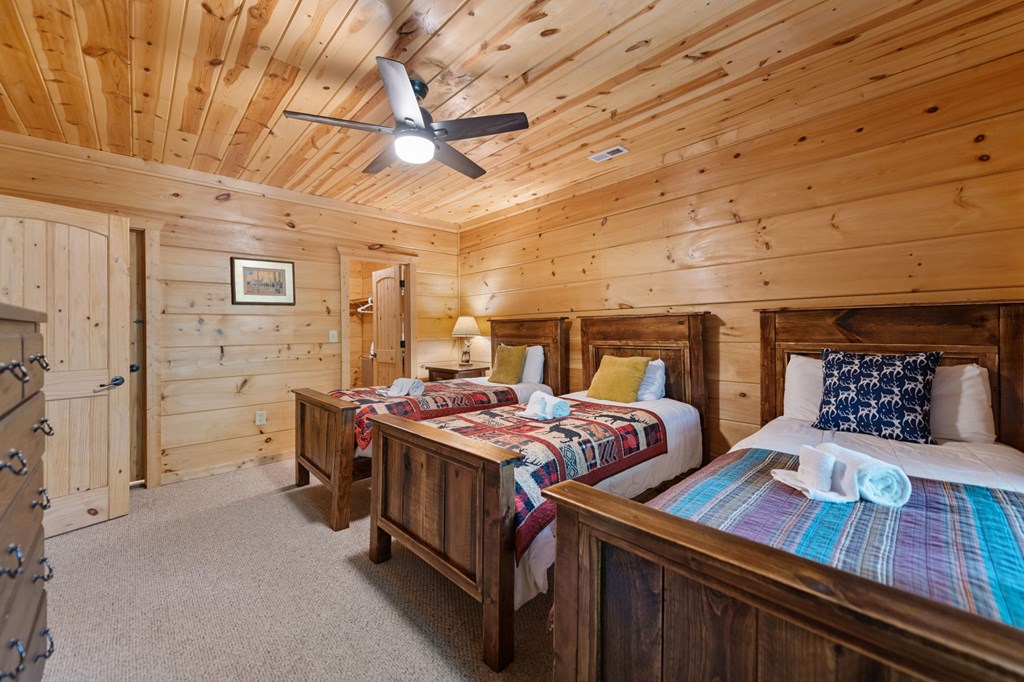 1082 Sunset Road Epworth, GA 30541 - Photo 83 of 98 a bedroom with two beds and a desk