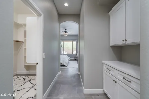 a spacious bathroom with a double vanity sink mirror and double