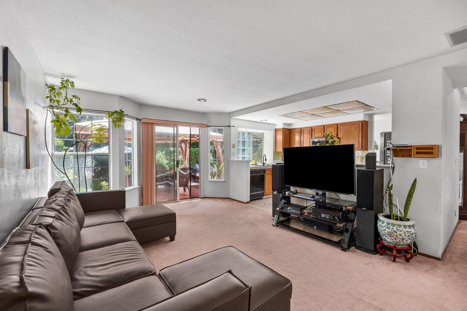 1001 Ignacio Court Pinole, CA 94564 - Photo 13 of 42 a living room with furniture and a flat screen tv