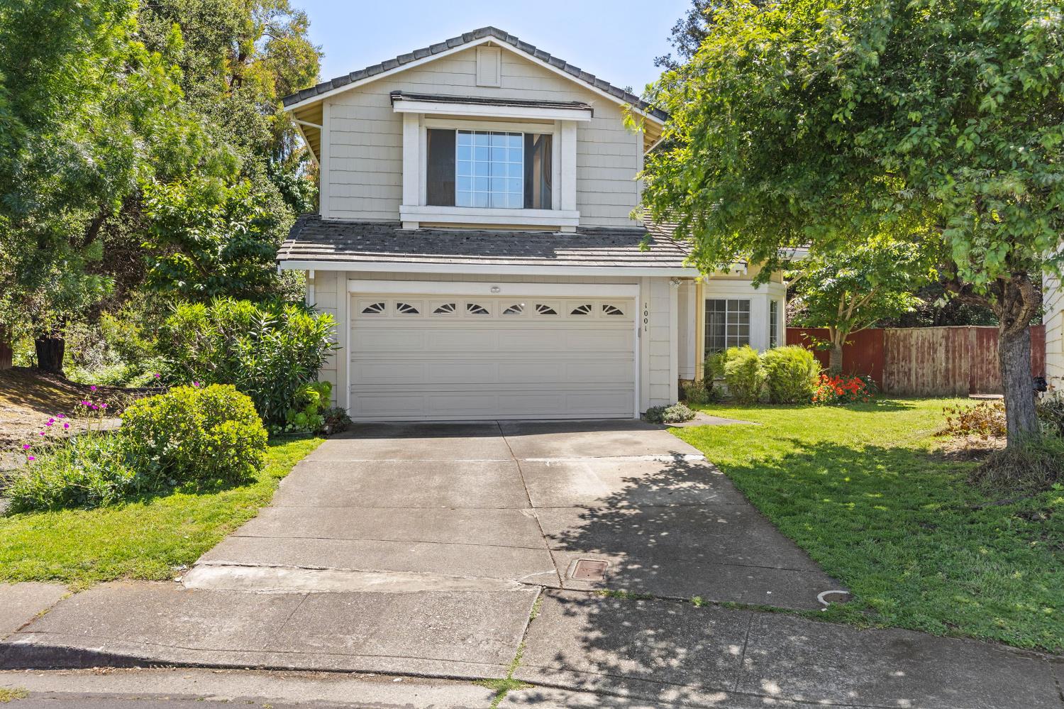 1001 Ignacio Court Pinole, CA 94564 - Photo 2 of 42 a front view of a house with garden
