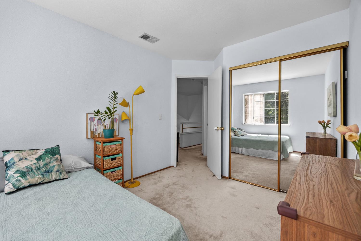 1001 Ignacio Court Pinole, CA 94564 - Photo 26 of 42 a bedroom with a bed and a dresser