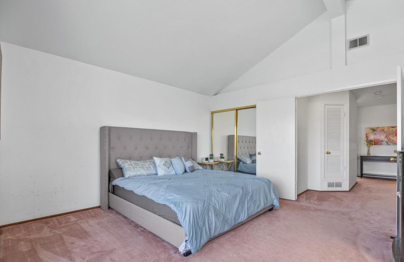 1001 Ignacio Court Pinole, CA 94564 - Photo 29 of 42 a bedroom with a bed and painting on the wall