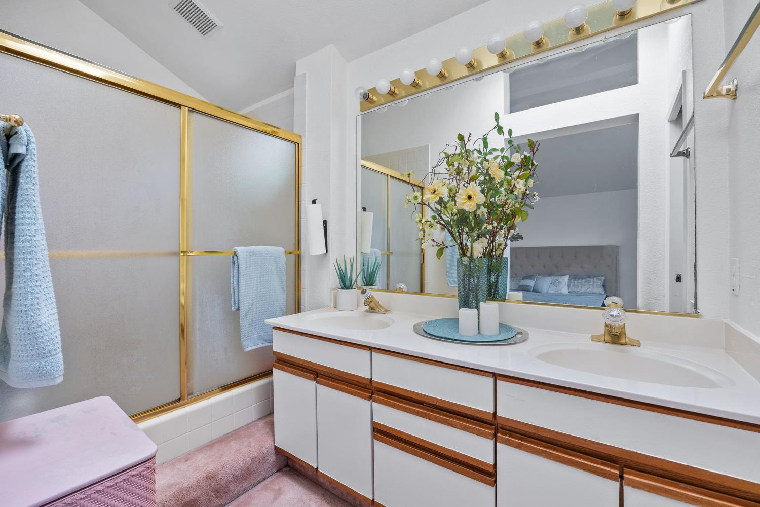 1001 Ignacio Court Pinole, CA 94564 - Photo 30 of 42 a bathroom with a sink a mirror and a shower