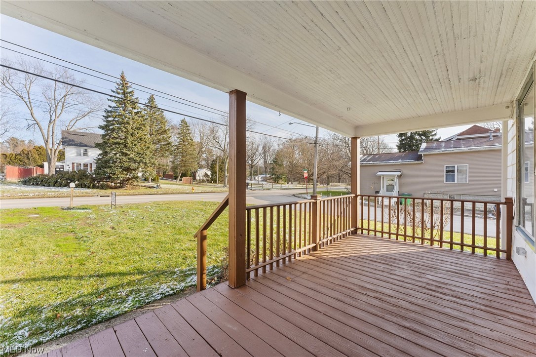 6343 Jefferson Road Ashtabula, OH 44004 - Photo 6 of 31 Wooden terrace with a lawn
