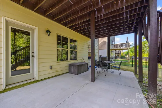 a view of a porch with chairs and a porch
