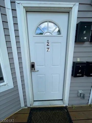 a bathroom with a window and shower