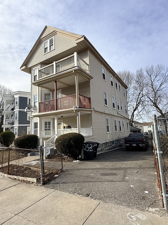 253 Norfolk Street, Unit 3 Boston, MA 02124 - Photo 14 of 14 a front view of a large building