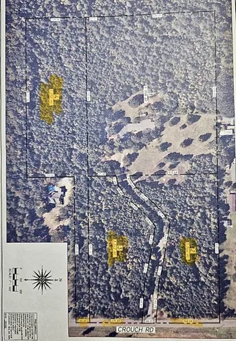 a aerial view of residential houses with swimming pool